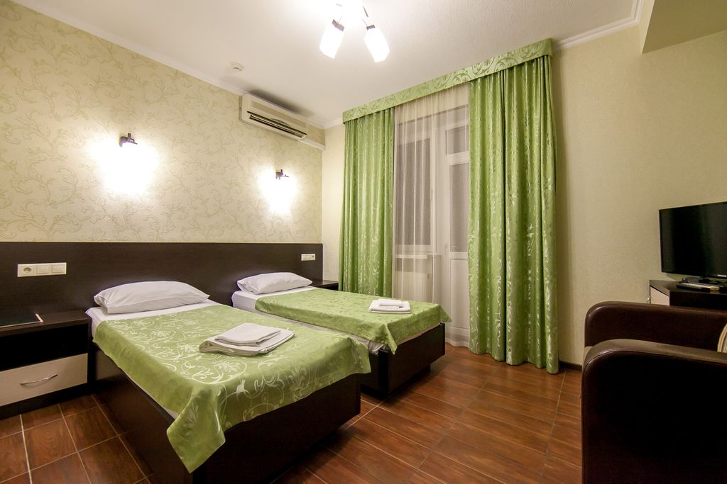 Олимпия — Двухместный номер с 2 отдельными кроватями Стандарт