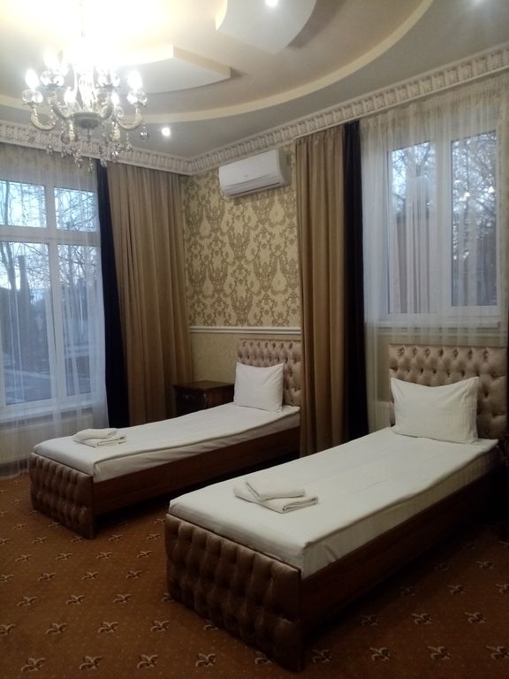 De Luxe — Двухместный номер с 2 отдельными кроватями Полулюкс