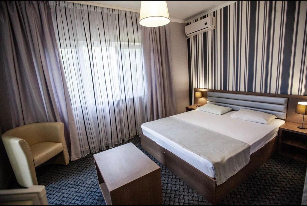 Ассоль — Двухместный номер с 1 кроватью стандарт с угловым балконом