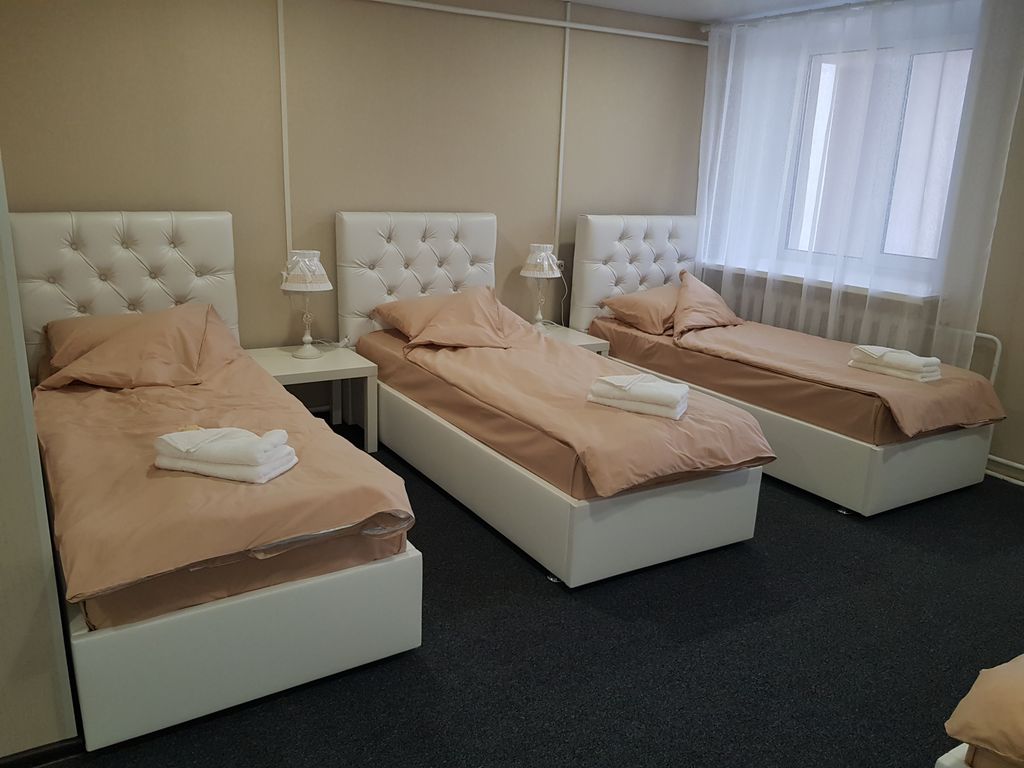 Победа — Четырёхместный номер полулюкс комфорт удобства в номере