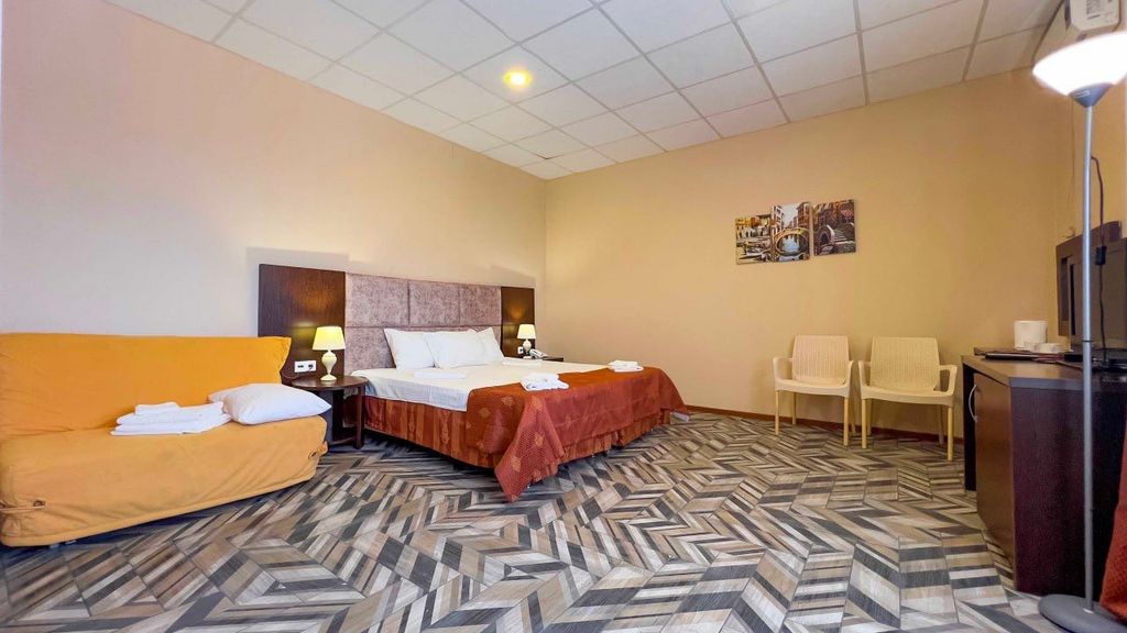 Атлет — Трёхместный номер Люкс с видом на море №6