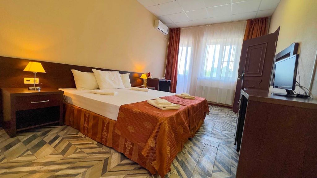 Атлет — Семейный номер стандарт с детской спальней и видом на море