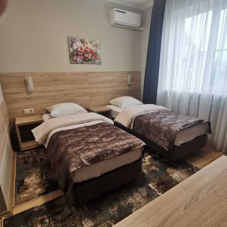 Магнолия — Двухместный номер с 2 отдельными кроватями стандарт