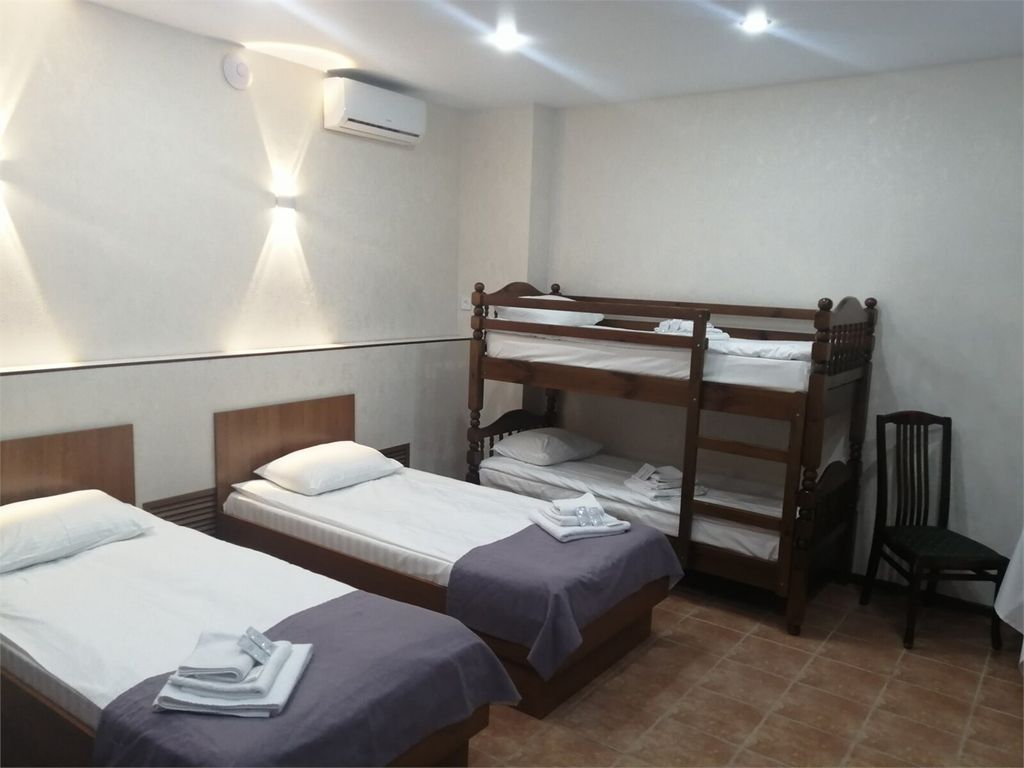 Усадьба Плешанова — Четырёхместный номер делюкс с сауной и бассейном