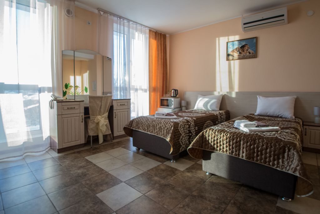 Золотой Лев — Двухместный номер с 2 отдельными кроватями стандарт 10/4