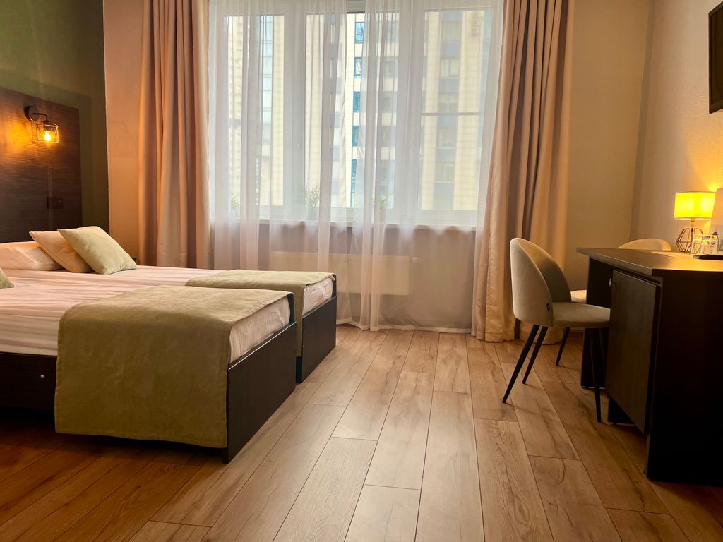 Космос — Двухместный номер с 2 отдельными кроватями улучшенный