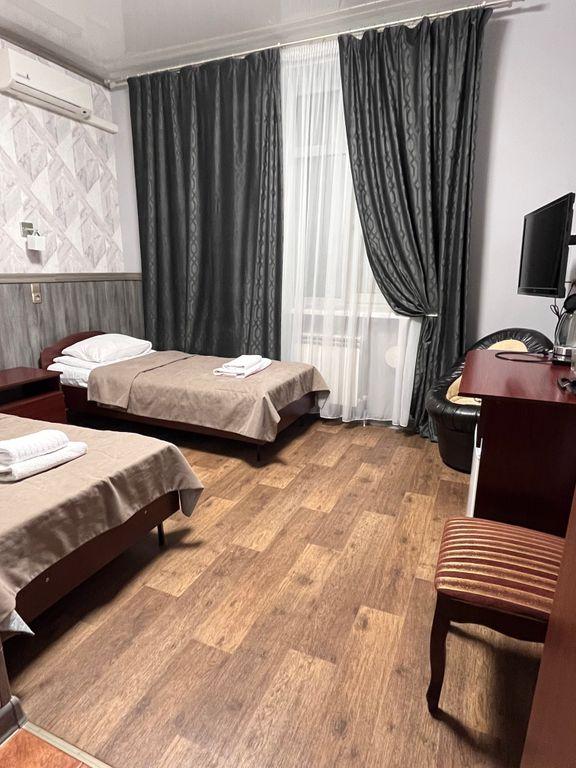 Корона — Двухместный номер с 2 отдельными кроватями стандарт