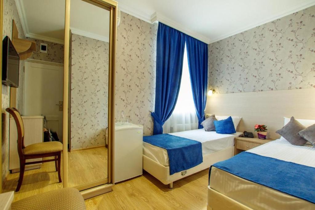 Атлас — Двухместный номер с 2 отдельными кроватями стандарт