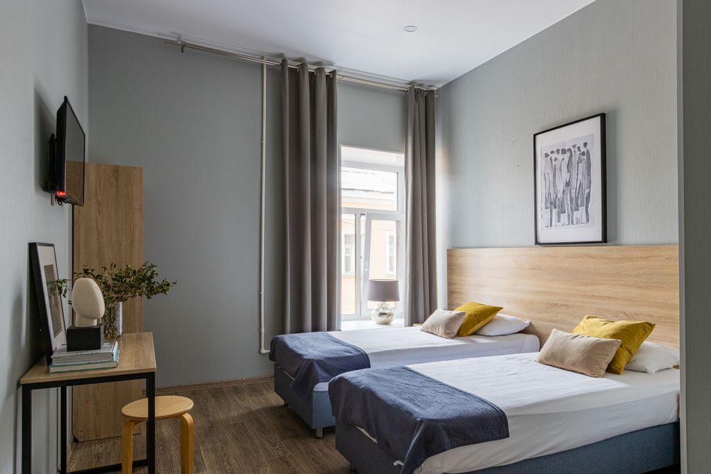 Номера на Невском 111 — Двухместный номер с 2 отдельными кроватями или 1 кроватью стандарт