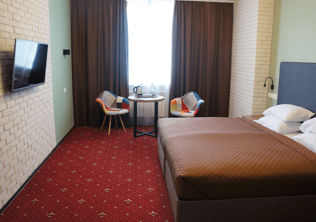 Sky hotel — Двухместный номер с 1 кроватью с одной большой кроватью king size