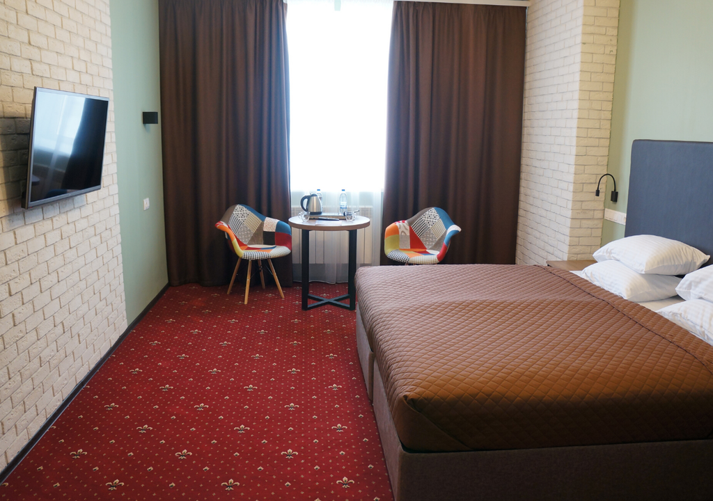 Sky hotel — Двухместный номер с 1 кроватью с одной большой кроватью king size