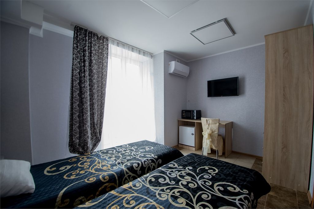 Золотой Лев — Двухместный номер с 2 отдельными кроватями Стандарт №11