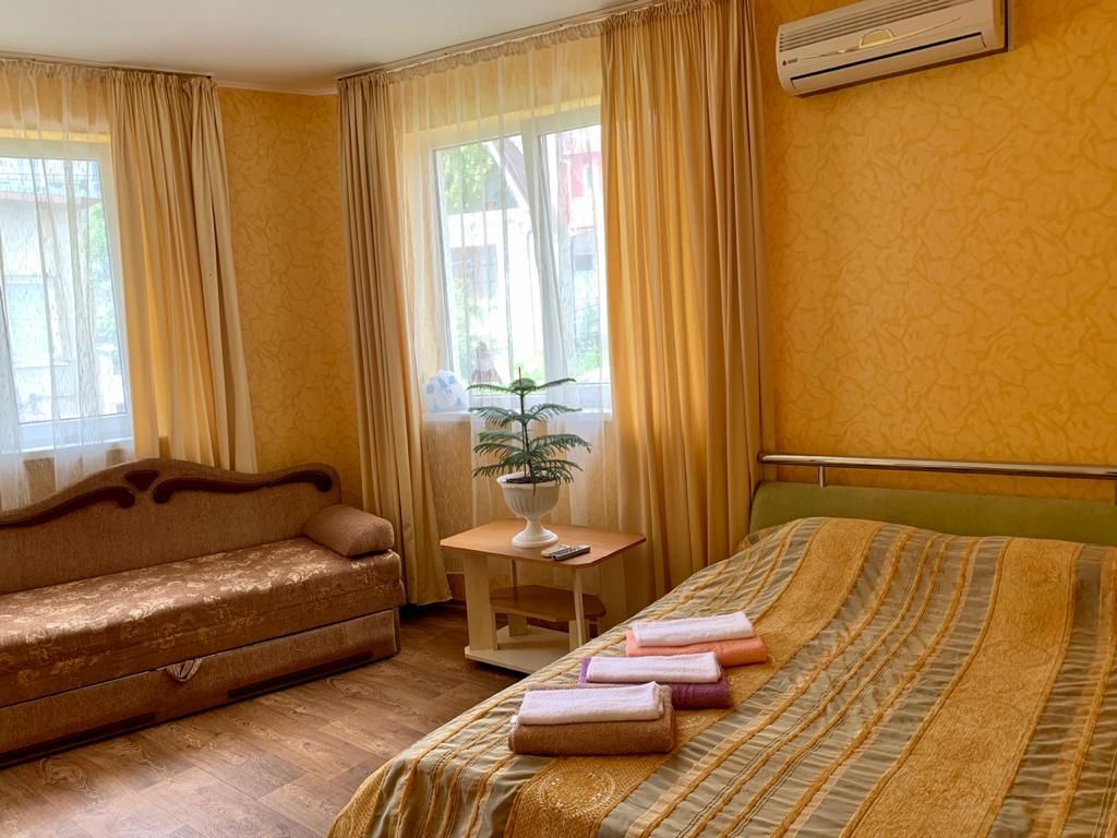 Морская волна — Четырёхместный номер стандарт с видом на горы