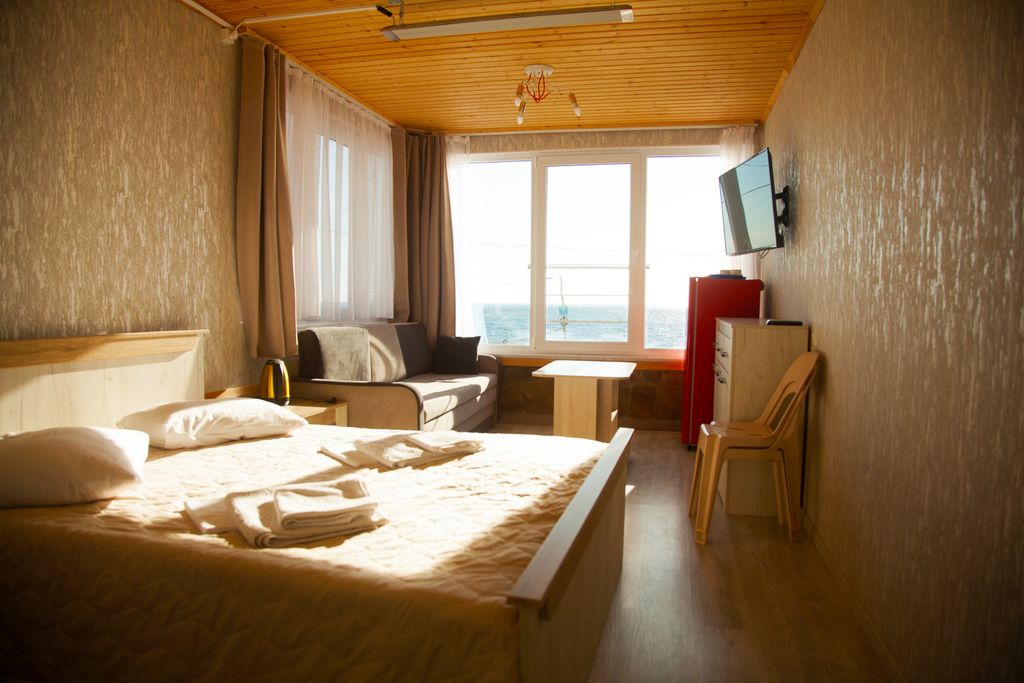 Прохлада — Трёхместный номер стандарт с видом на море