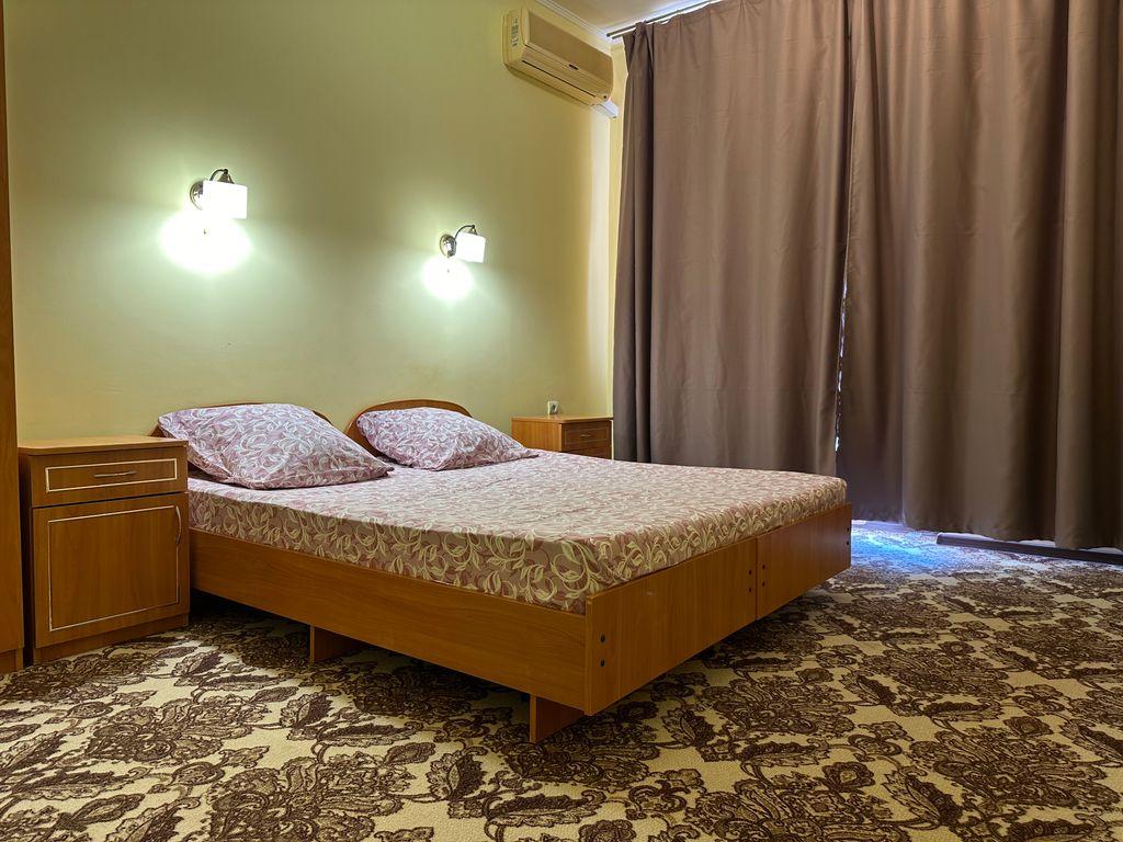 Олимп — Двухместный номер с 2 отдельными кроватями люкс