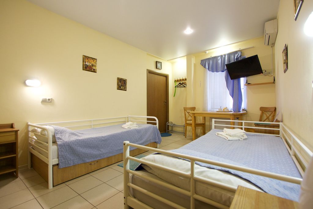 Одиссея — Двухместный номер с 2 отдельными кроватями эконом