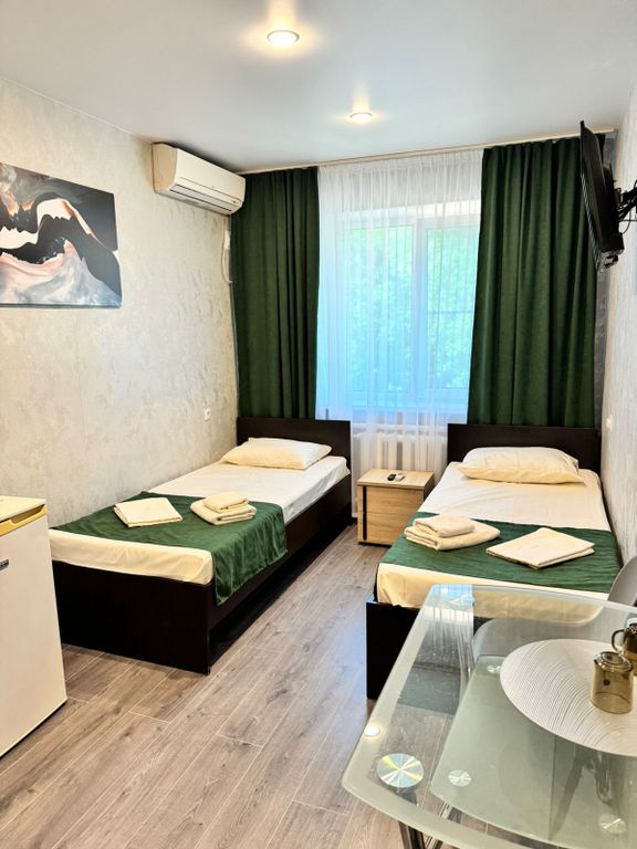 Каштан — Двухместный номер с 2 отдельными кроватями улучшенный