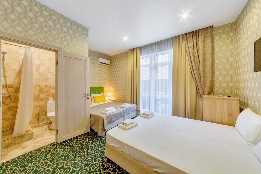 Премьер — Четырёхместный номер стандарт с террасой