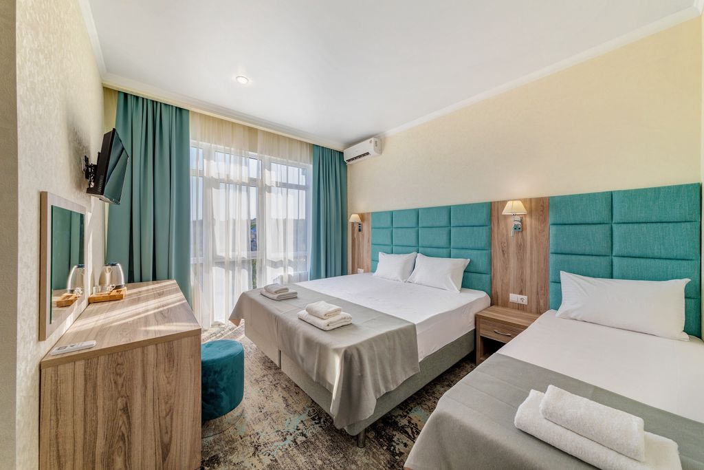 Премьер — Трёхместный номер улучшенный стандарт