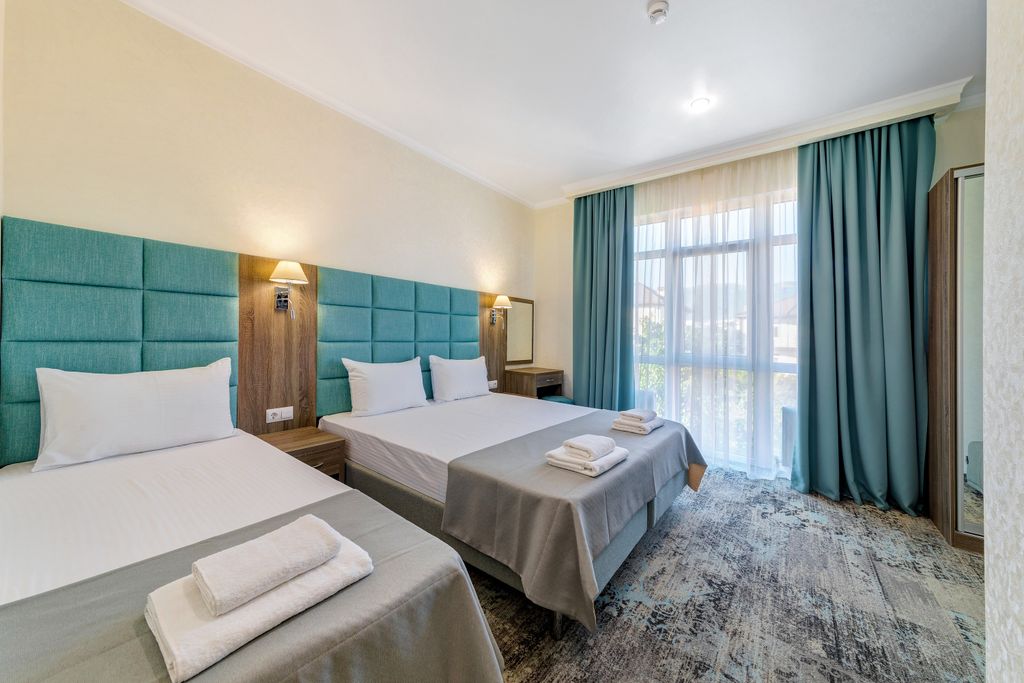 Премьер — Четырёхместный номер улучшенный стандарт