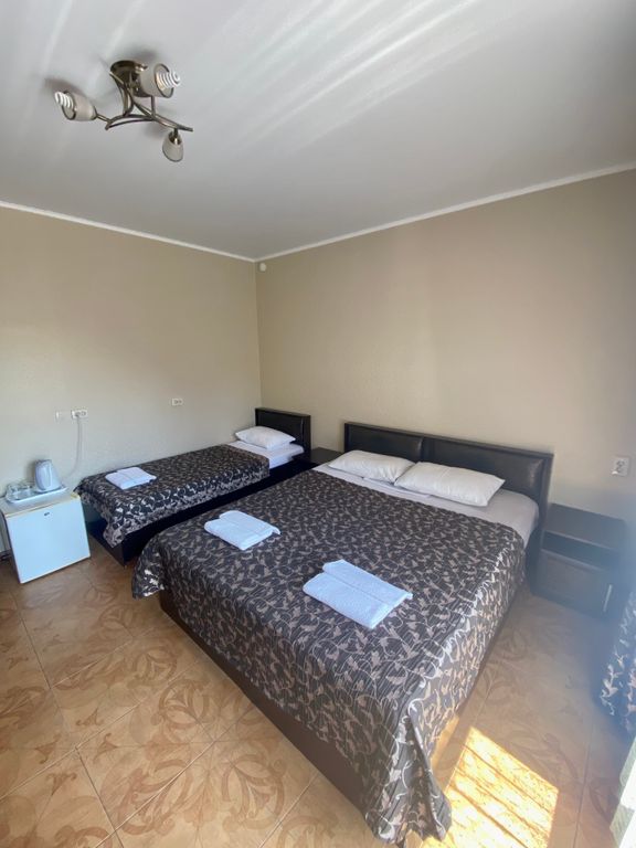 Александра — Четырёхместный номер комфорт с балконом