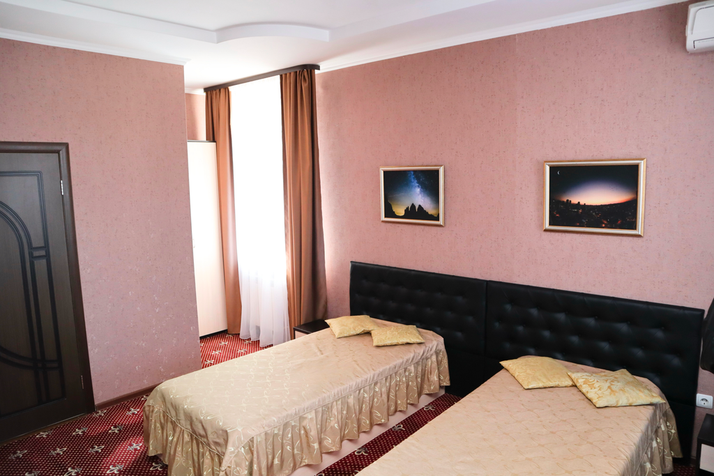 Твой — Двухместный номер с 2 отдельными кроватями люкс