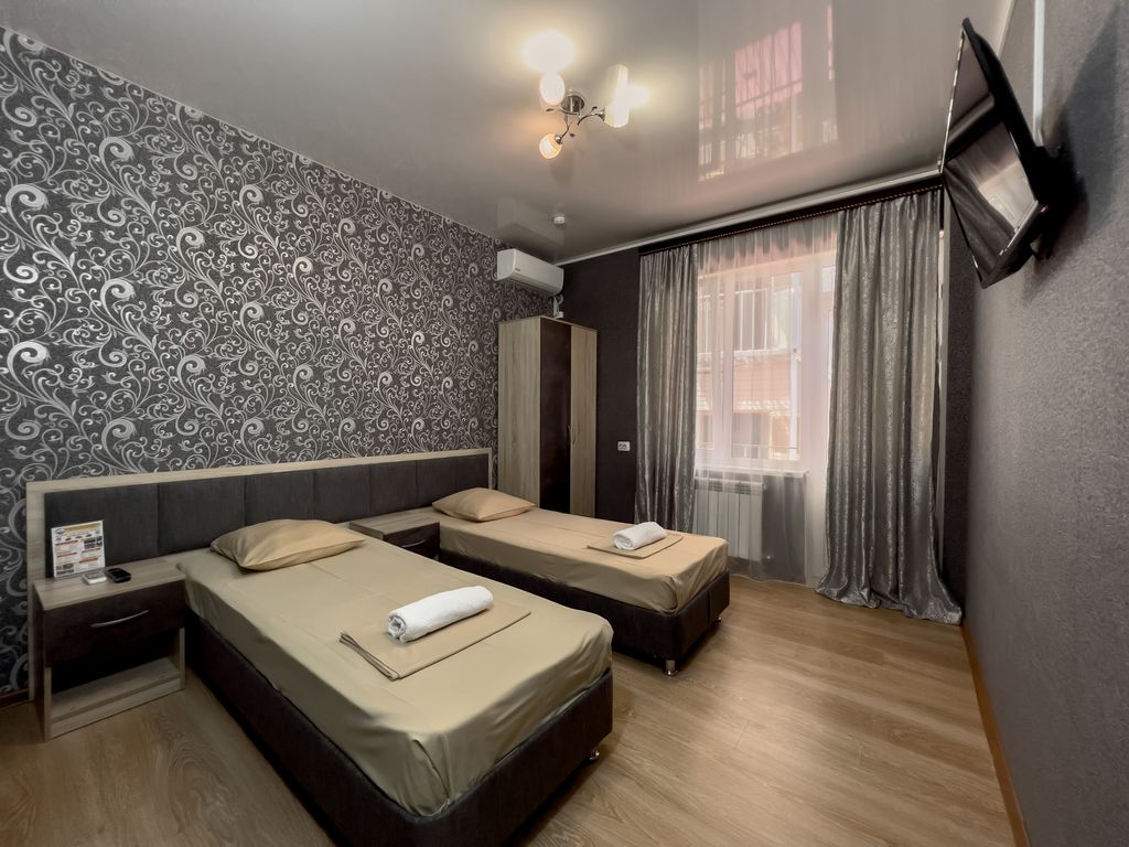 Корона — Двухместный номер с 2 отдельными кроватями стандарт