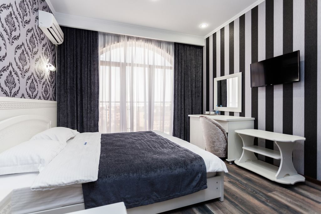 Абсолют — Трёхместный номер Стандарт Делюкс с доп.местом