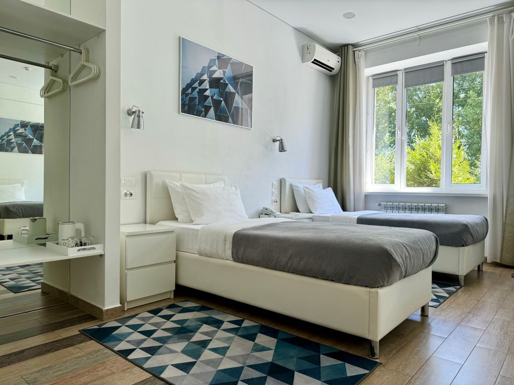 Призма — Двухместный номер с 2 отдельными кроватями Стандарт с двумя кроватями