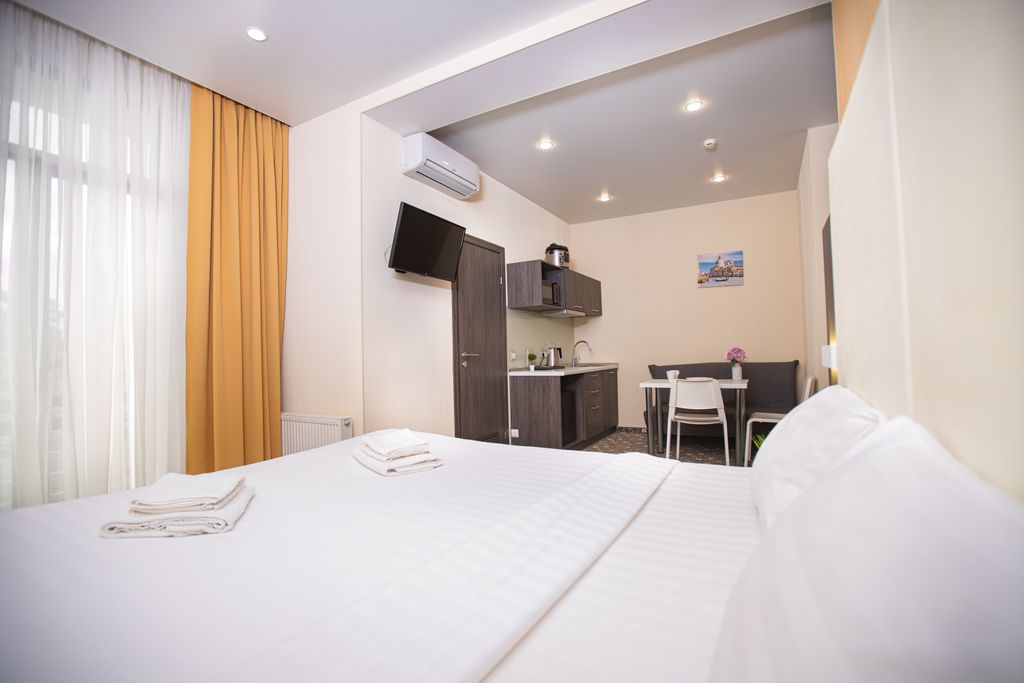 МIO — Трёхместный номер апартаменты делюкс с кроватью king-size для 4 гостей