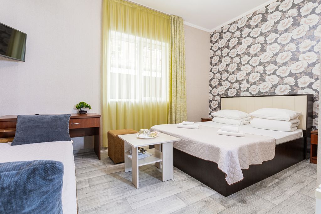 Lotos — Двухместный номер с 1 кроватью на первом этаже с двуспальной кроватью