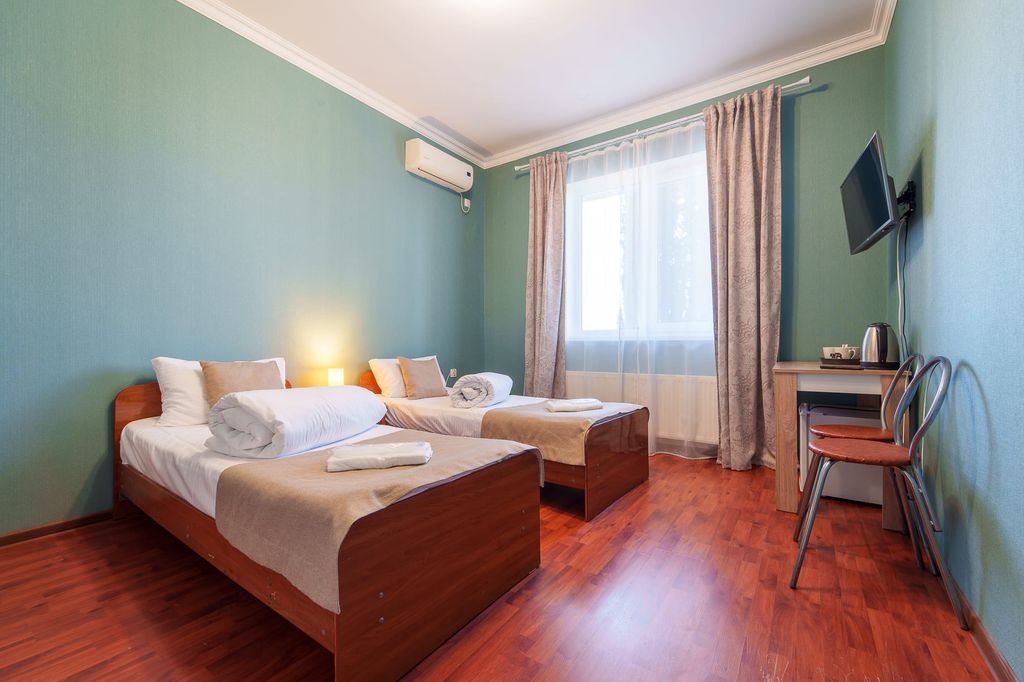 Ля Вилла — Двухместный номер с 2 отдельными кроватями стандарт с личной ванной комнатой рядом с номером