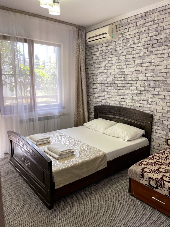 Киви — Двухместный номер с 1 кроватью семейный номер с двуспальной кроватью