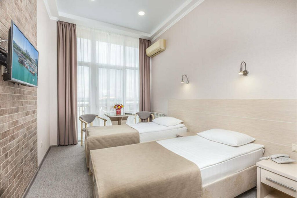 Капитан — Двухместный номер с 2 отдельными кроватями студио-стандарт 1 этаж