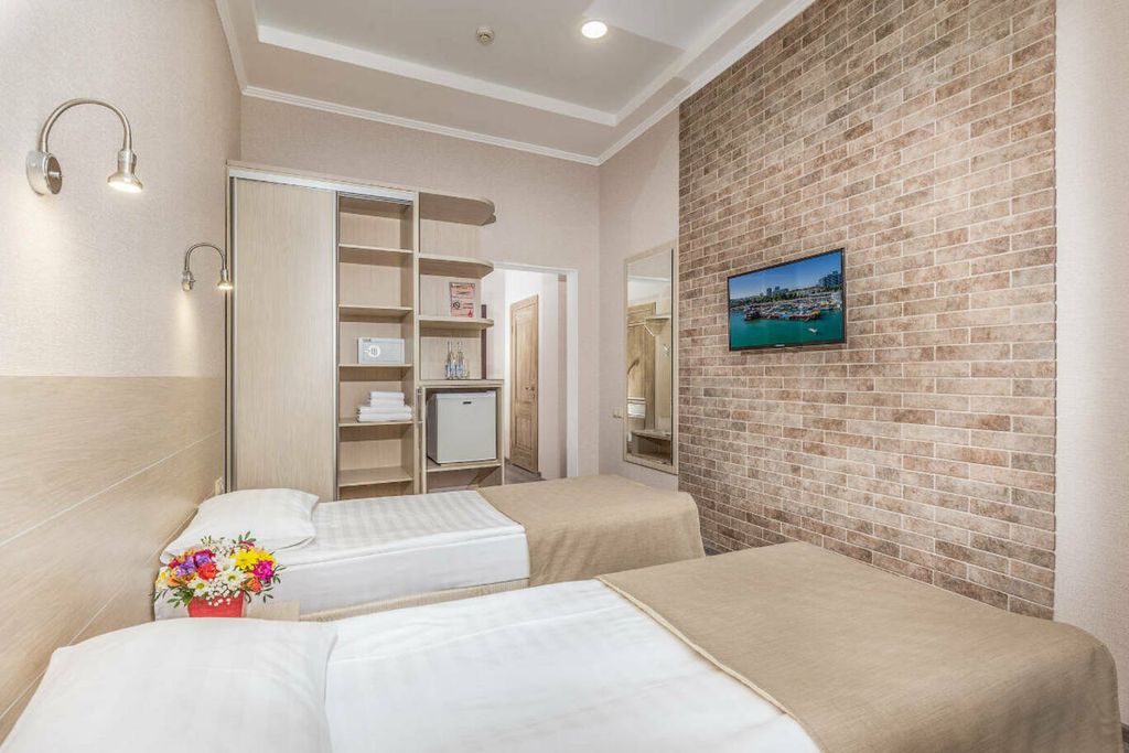 Капитан — Двухместный номер с 2 отдельными кроватями студио-стандарт 2 этаж