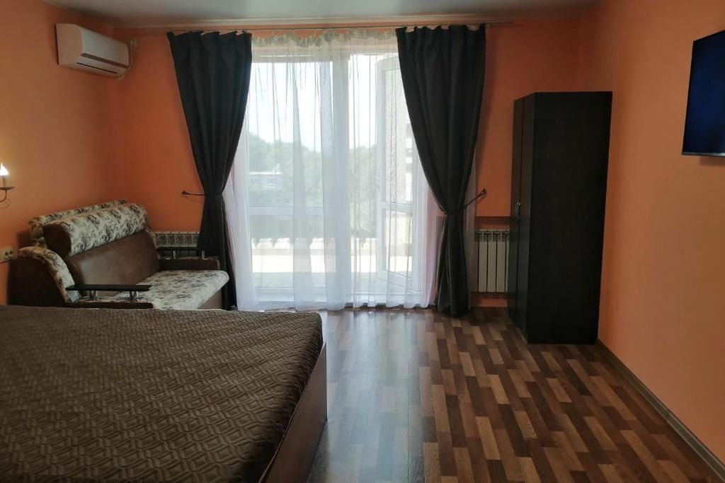 Meduza — Четырёхместный номер улучшенный с видом на море