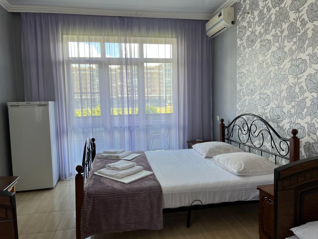 Angel — Четырёхместный номер стандарт с двуспальной кроватью