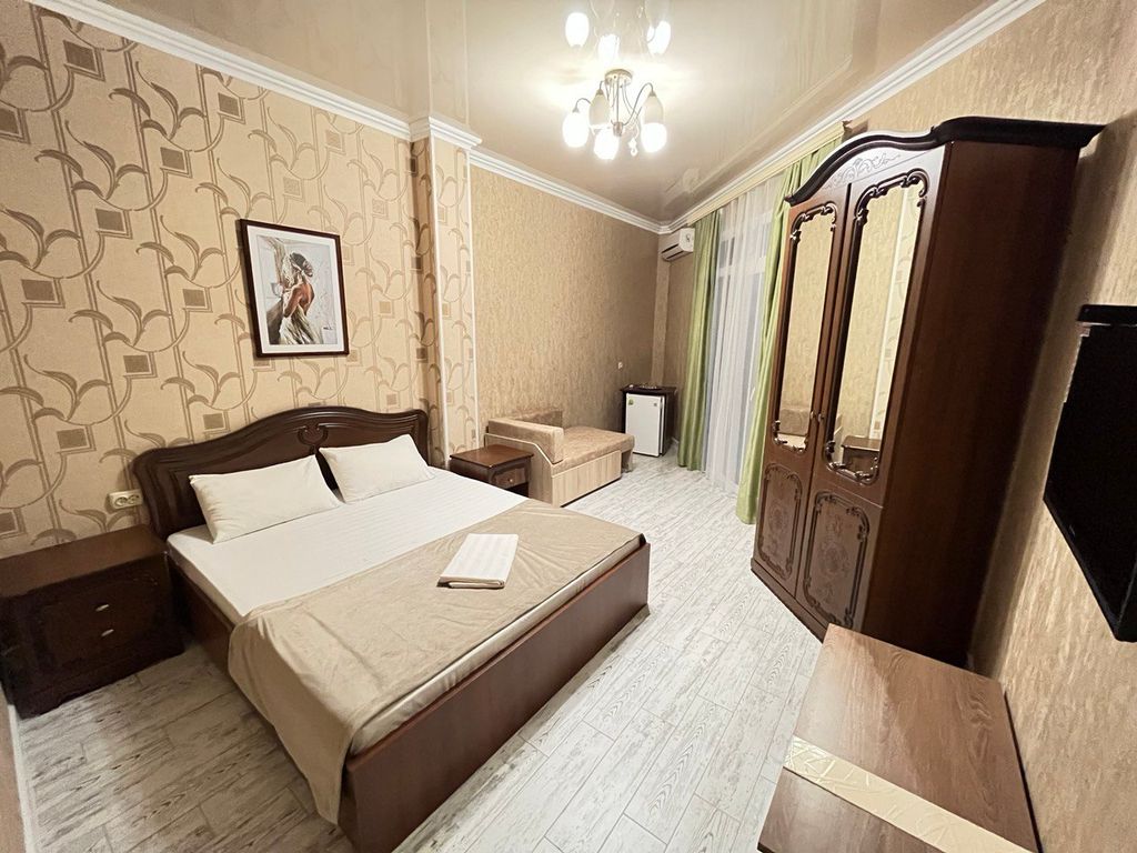 Ривер — Трёхместный номер стандарт с балконом