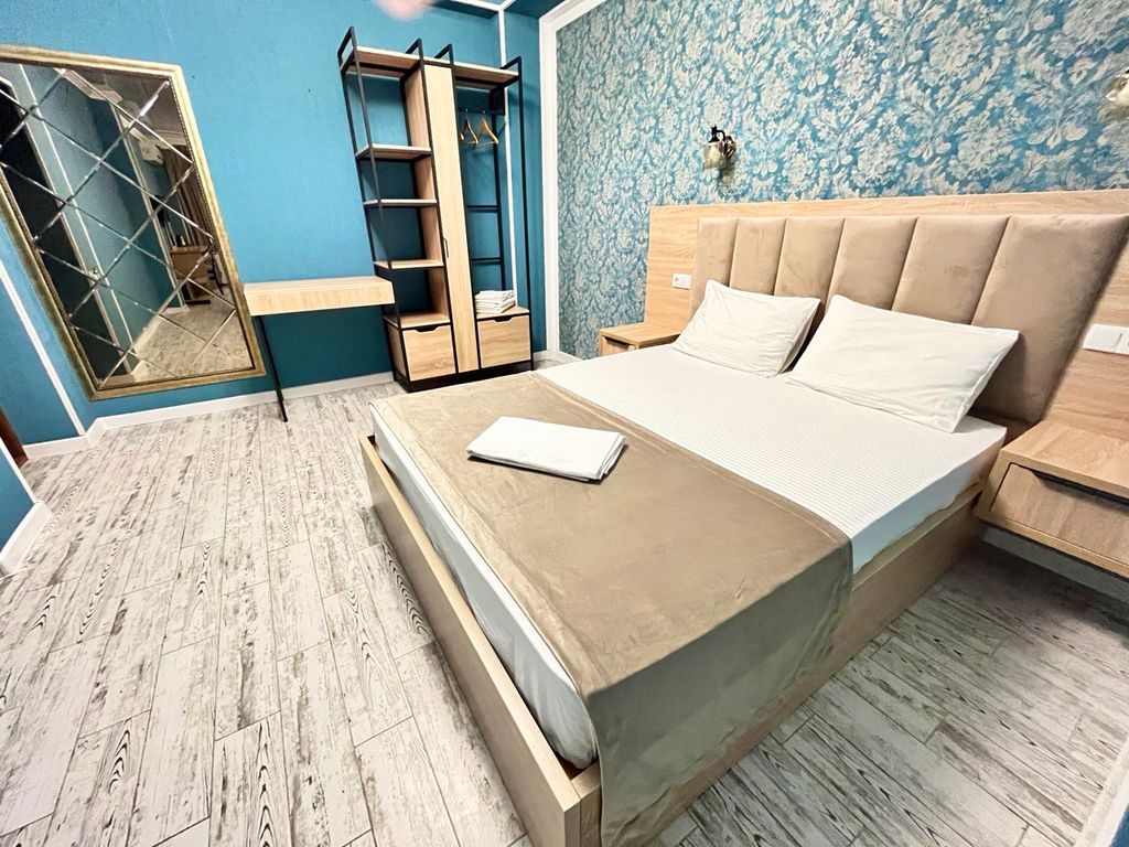 Ривер — Четырёхместный номер делюкс с балконом