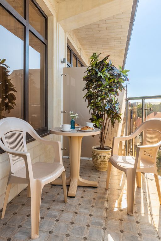 Атлант — Четырёхместный номер Люкс с балконом