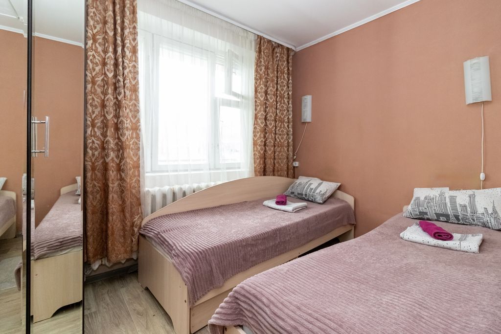 Наш — Двухместный номер с 2 отдельными кроватями