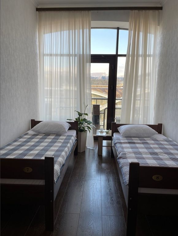 Сириус — Двухместный номер с 2 отдельными кроватями с балконом