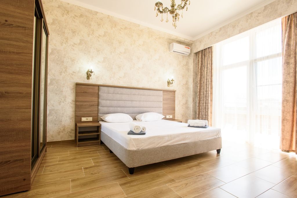 Санторини — Четырёхместный номер двухкомнатный люкс