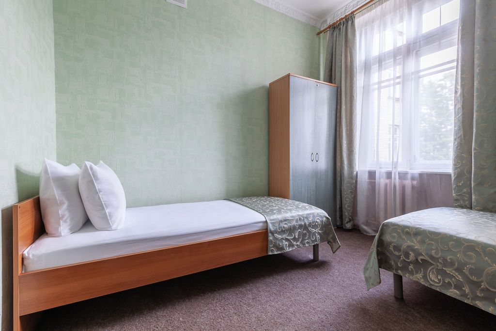 Турист — Двухместный номер с 2 отдельными кроватями Эконом с двумя раздельными кроватями и удобствами на этаже
