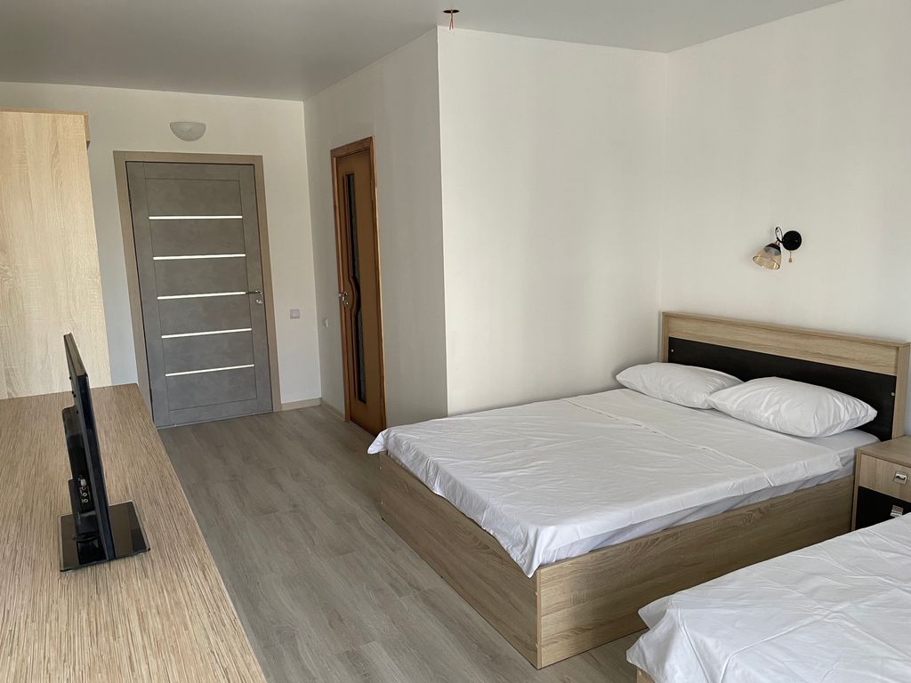 Клёны — Четырёхместный номер с двумя двуспальными кроватями