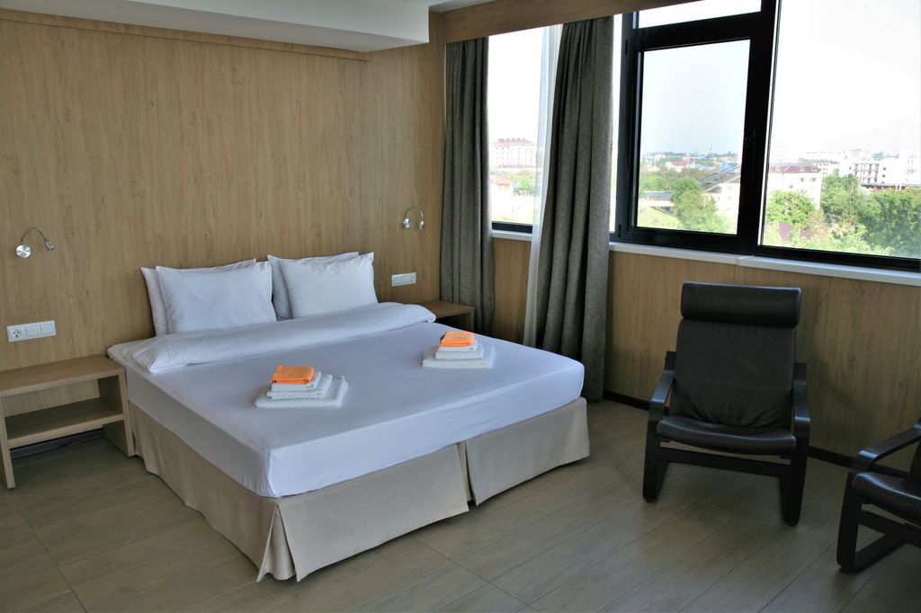 Браво — Четырёхместный номер улучшенный с видом на море