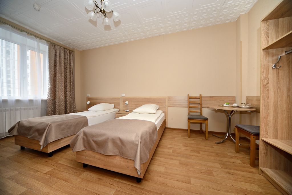 СРГК ВОС — Трёхместный номер улучшенный с видом на город