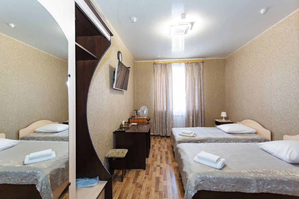 Корона — Двухместный номер с 2 отдельными кроватями улучшенный