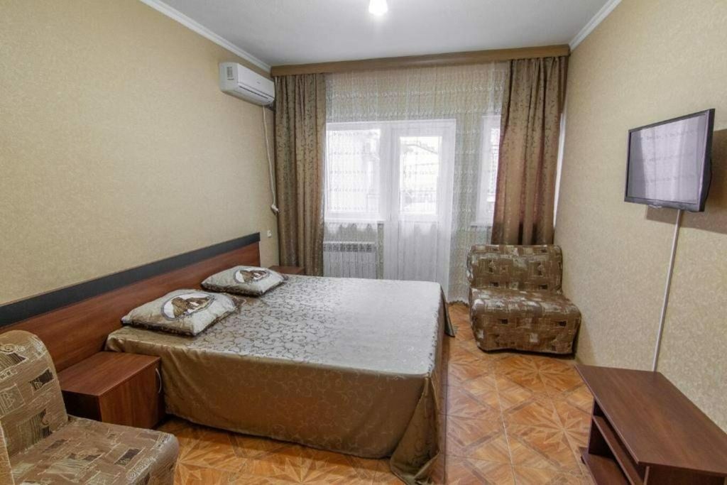 Анна — Четырёхместный номер стандарт с балконом