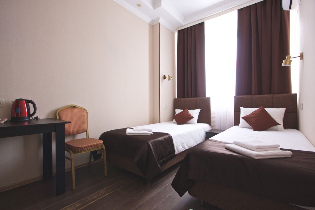 АвтоДвор — Двухместный номер с 2 отдельными кроватями Эконом с 2 раздельными кроватями